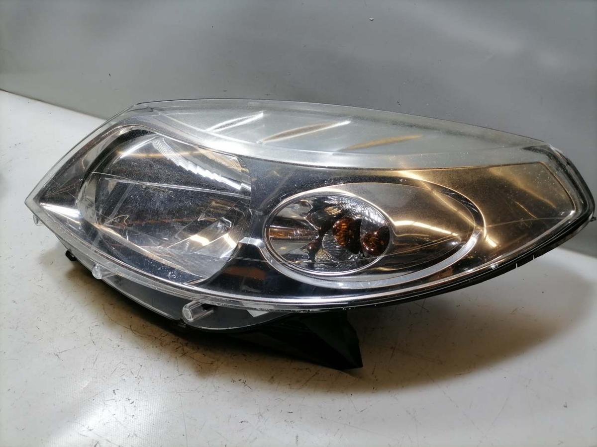 Dacia Sandero original Scheinwerfer links Halogen obehalb leicht vergilbt Bj.2009